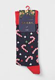 Χριστουγεννιάτικες κάλτσες Soma Socks με σχέδιο candy canes και αστέρια σε μπλε φόντο.

